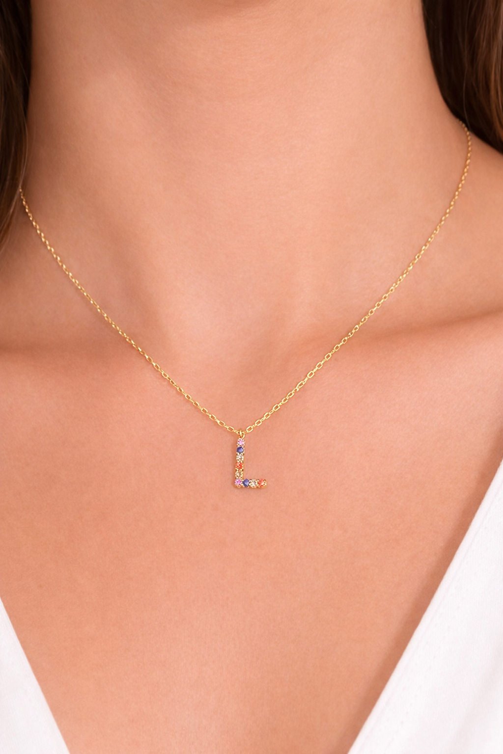 Beautiful chain for lady with charm with initial L with natural sapphires of gold colors 18k real size 18