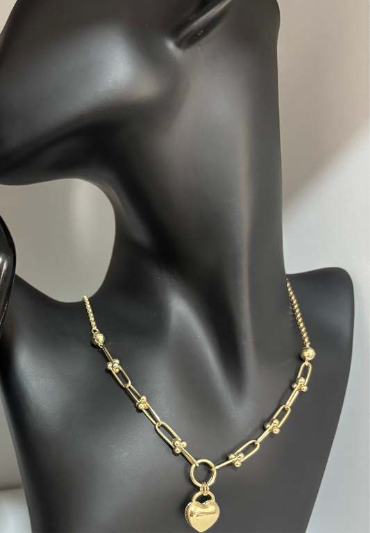 Choker with heart charm, size 18 adjustable to 16; 10k gold rel