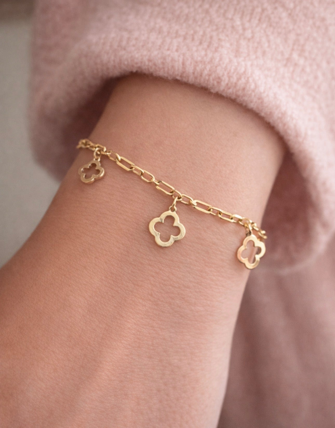 Beautiful bracelet with 10k gold pendants real size 7.5 and fits size 7